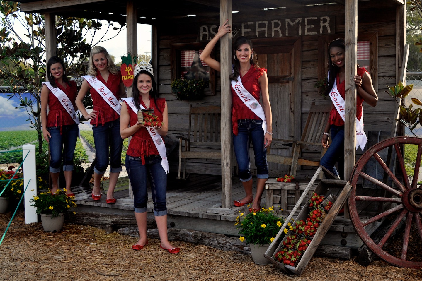 Florida Strawberry Festival Strawberry Queen Victoria Watkins and Court in front of our Ask the Farmer Booth