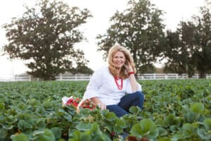 Strawberry Sue in a strawberry field.